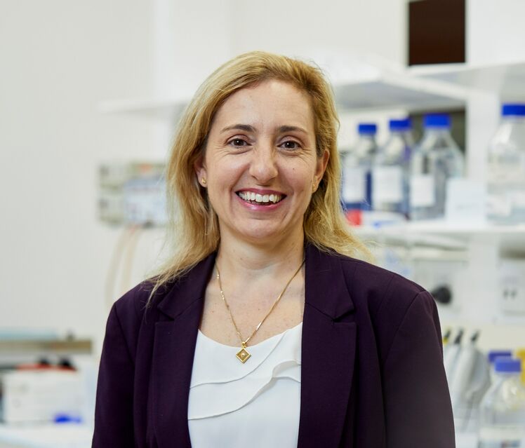 Freda Passam in lab 0552 crop
